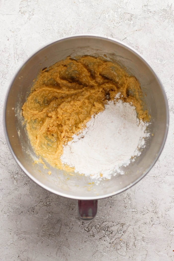 Dry ingredients added to wet ingredients in mixing bowl