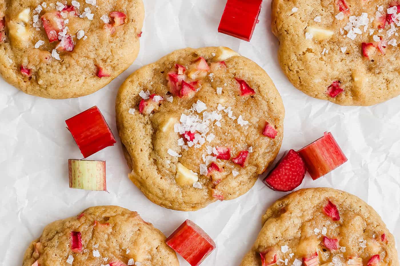 Overhead view of rhubarb cookies topped with flaky sea salt