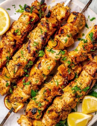 chicken skewers with fresh lemon and black pepper