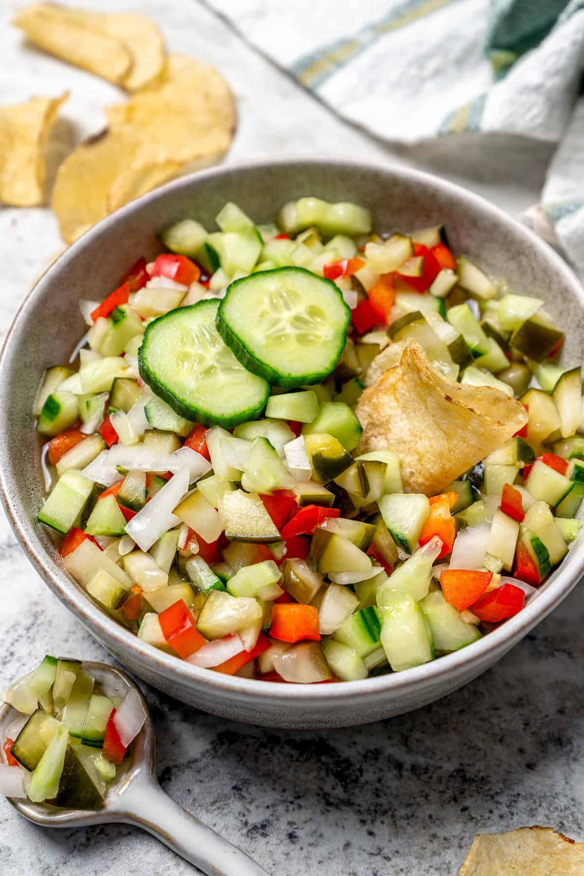 Pickle de gallo in bowl with potato chip