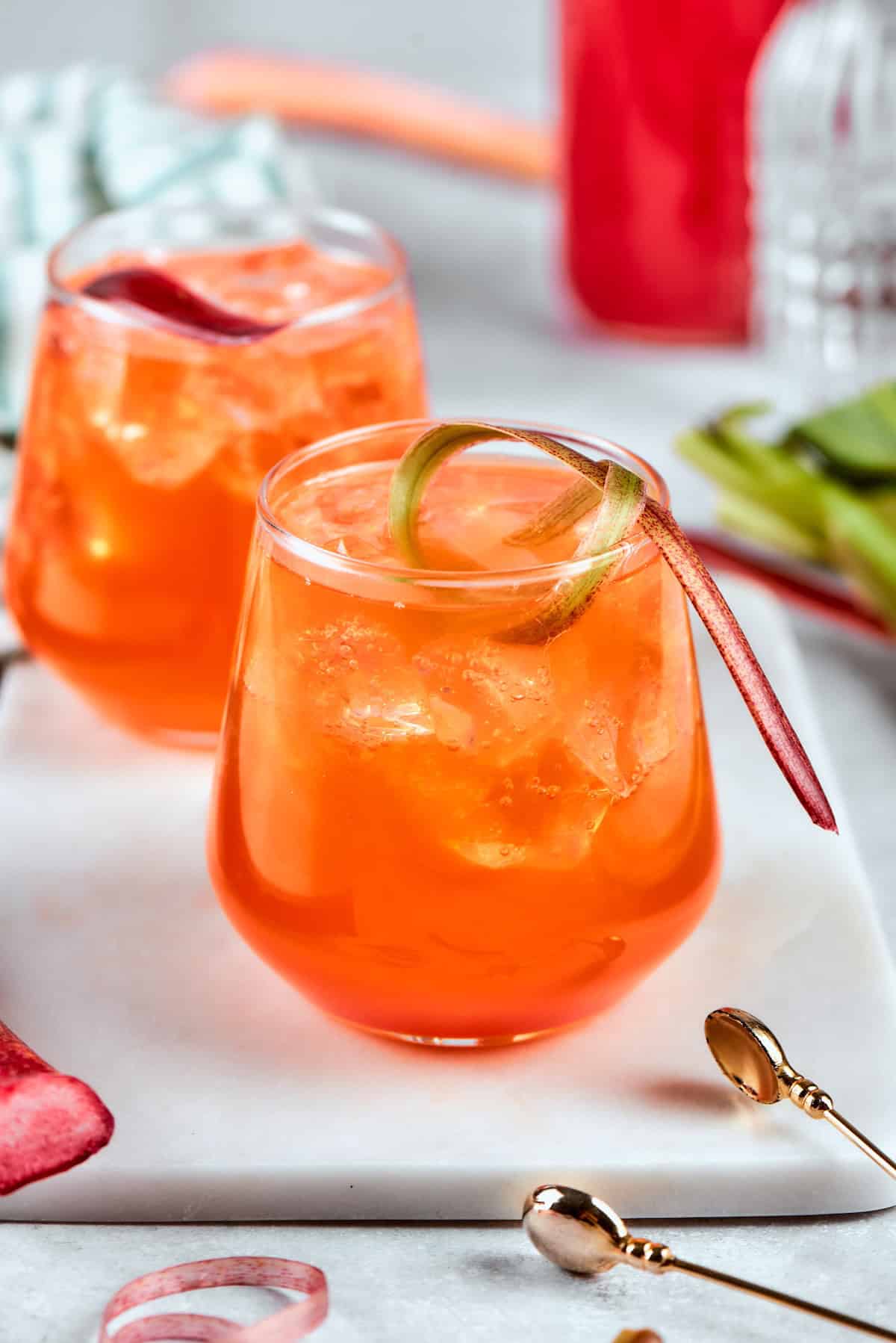 Two rhubarb aperol spritz cocktails