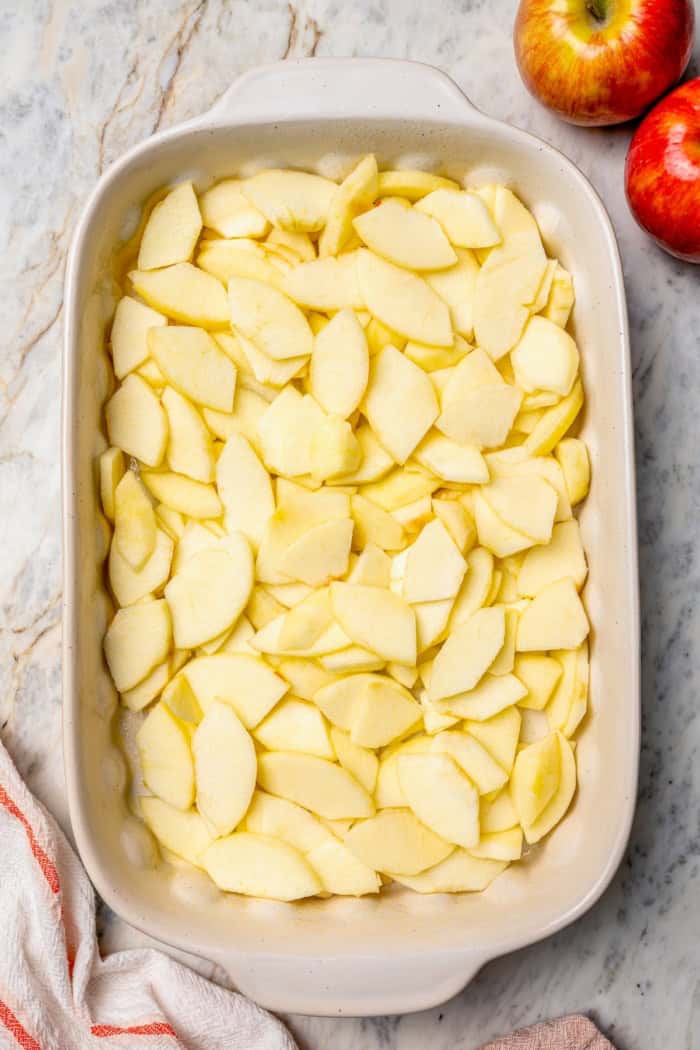 Apples in baking dish.