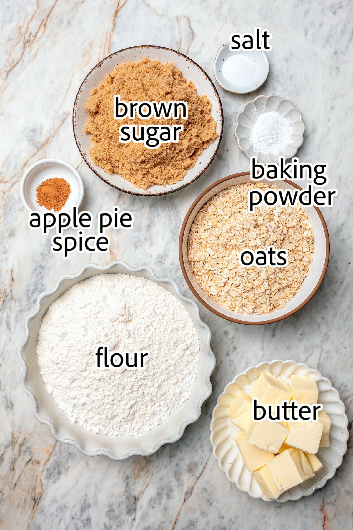 A brown sugar oat crumble mixture doubles as a crust and a topping for these easy Apple Pie Bars. The perfect fall treat for a crowd! ingredients needed for apple pie bars