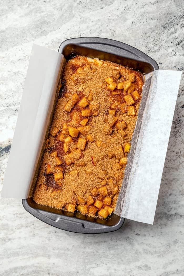 Apple fritter bread in pan before baking.
