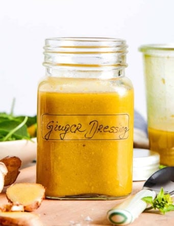 a jar of fresh ginger dressing, with a label