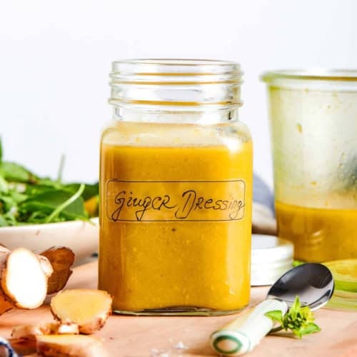 a jar of fresh ginger dressing, with a label