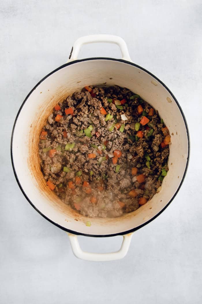 Meat and vegetables cooked in Dutch oven.