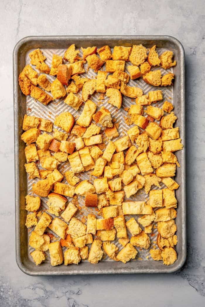 Toasted French bread on pan.