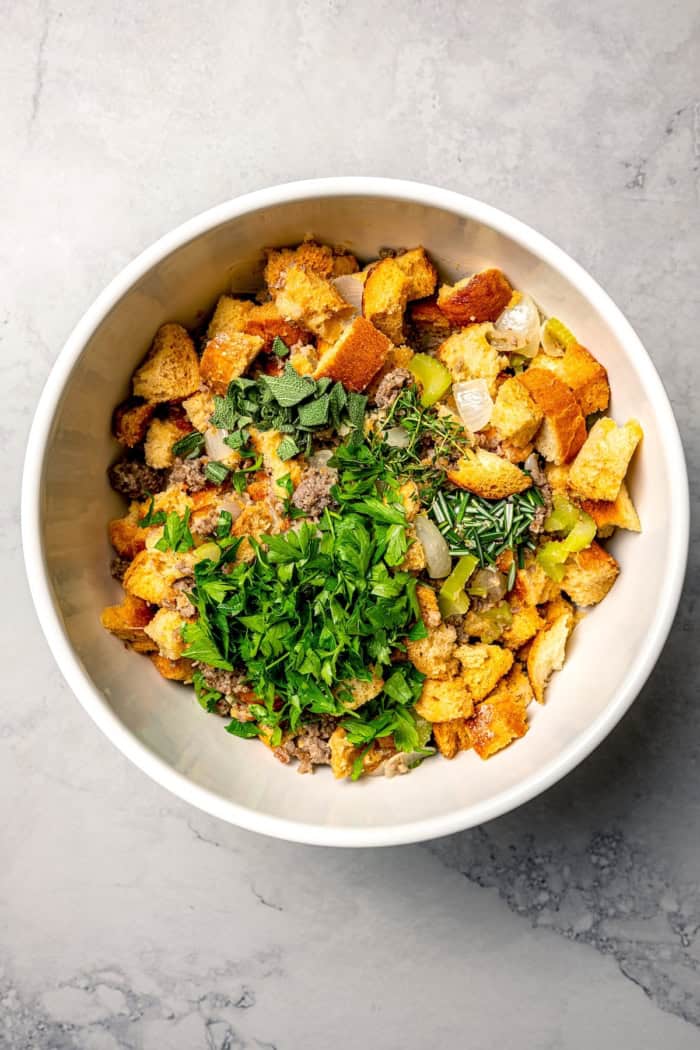 Ingredients for stuffing in large bowl.