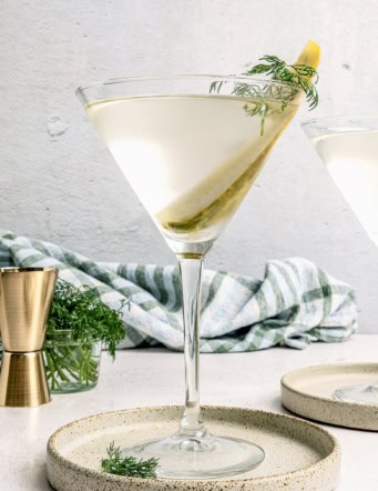 a pickle juice martini in a martini glass