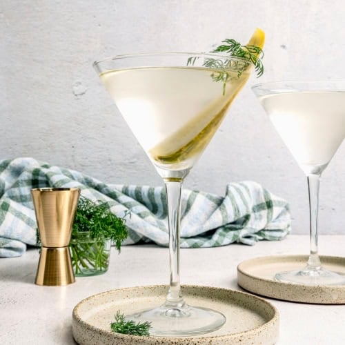 a pickle juice martini in a martini glass