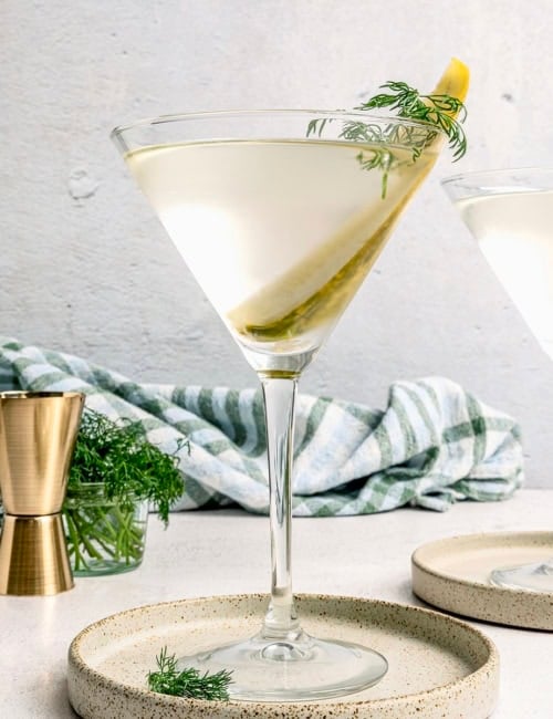a pickle juice martini in a martini glass