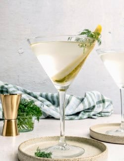 a pickle juice martini in a martini glass