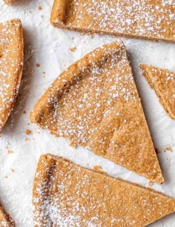 wedges of spice cookies sprinkled with powdered sugar