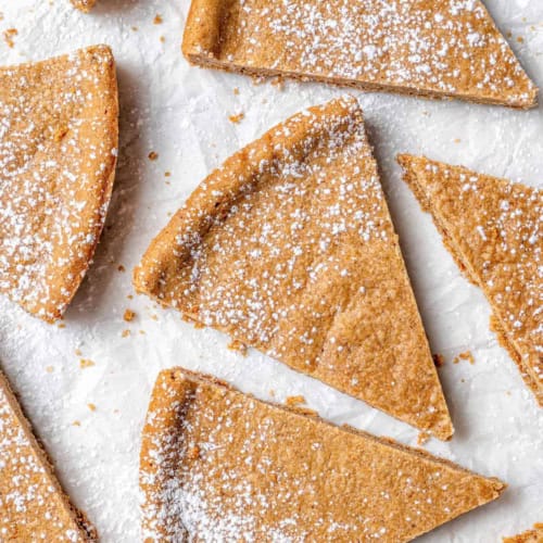 wedges of spice cookies sprinkled with powdered sugar