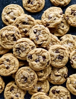 overhead photo of a big spread of peanut butter chocolate chip cookies