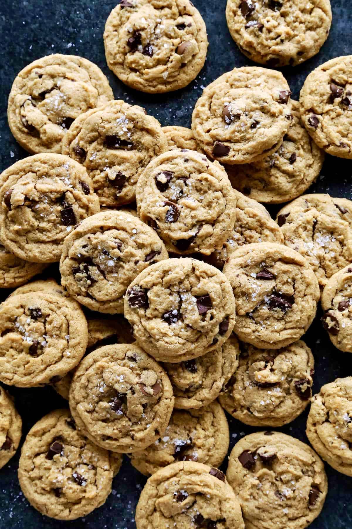 overhead photo of a big spread of peanut butter chocolate chip cookies