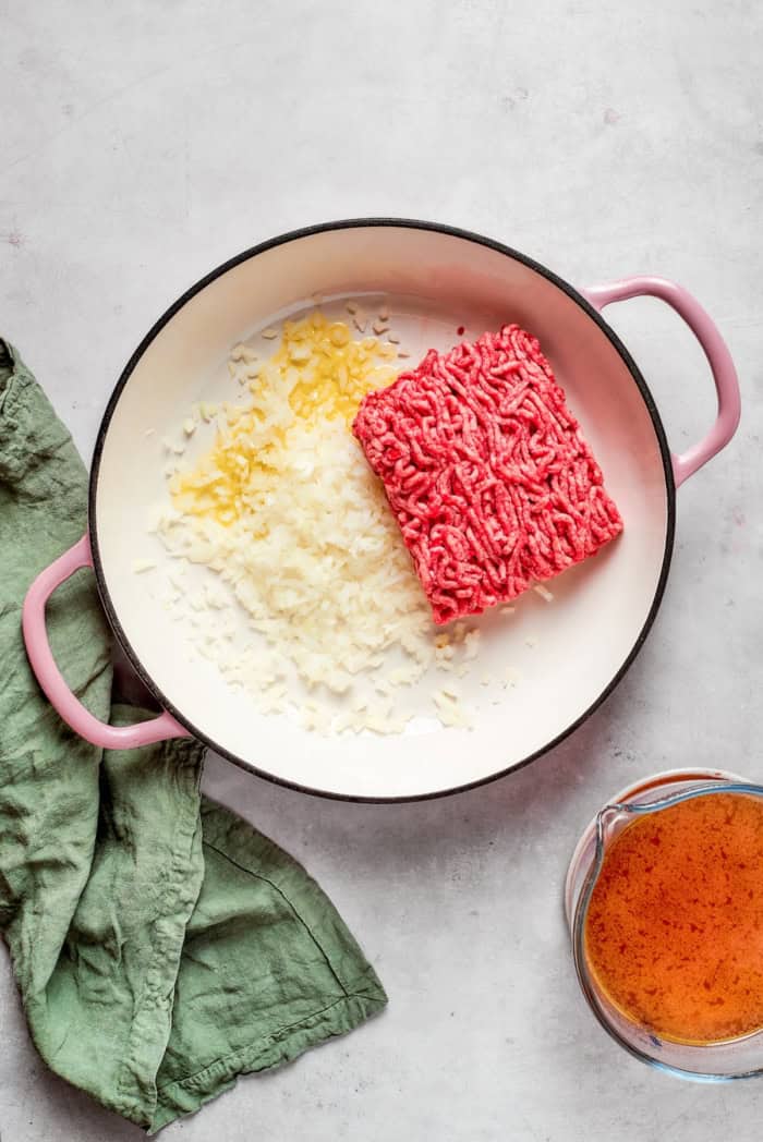 Onion, garlic, and ground beef in skillet.