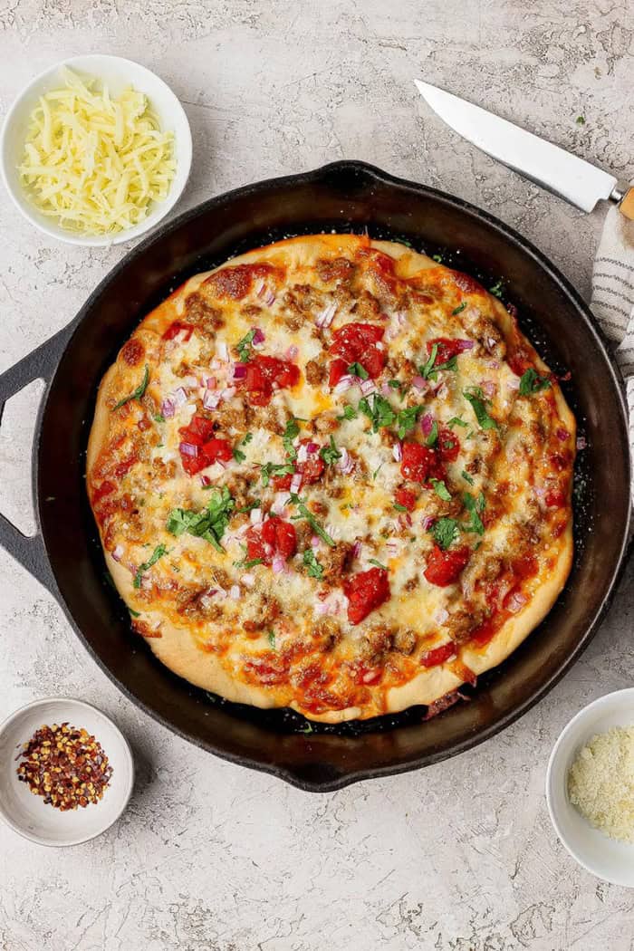pizza cooked in a cast iron skillet