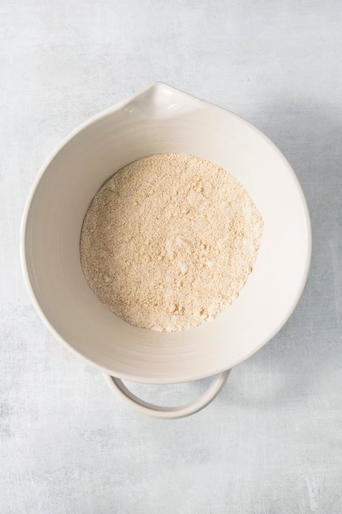 Dry ingredients for financiers in bowl.