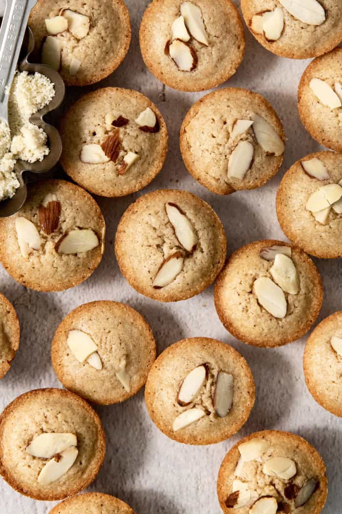Almond financiers on countertop.