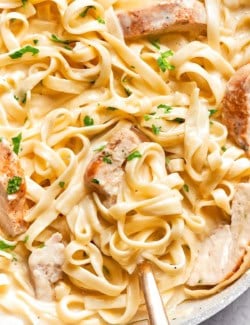 Skillet of chicken fettuccine alfredo.