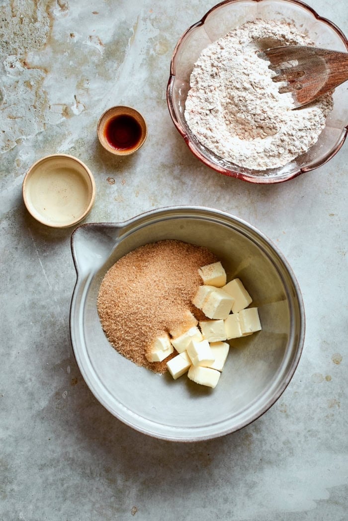 Butter and brown sugar in mixing bowl.