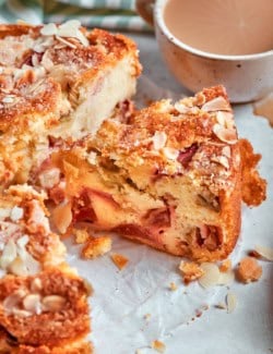 Slice of Norwegian rhubarb cake with cup of coffee.