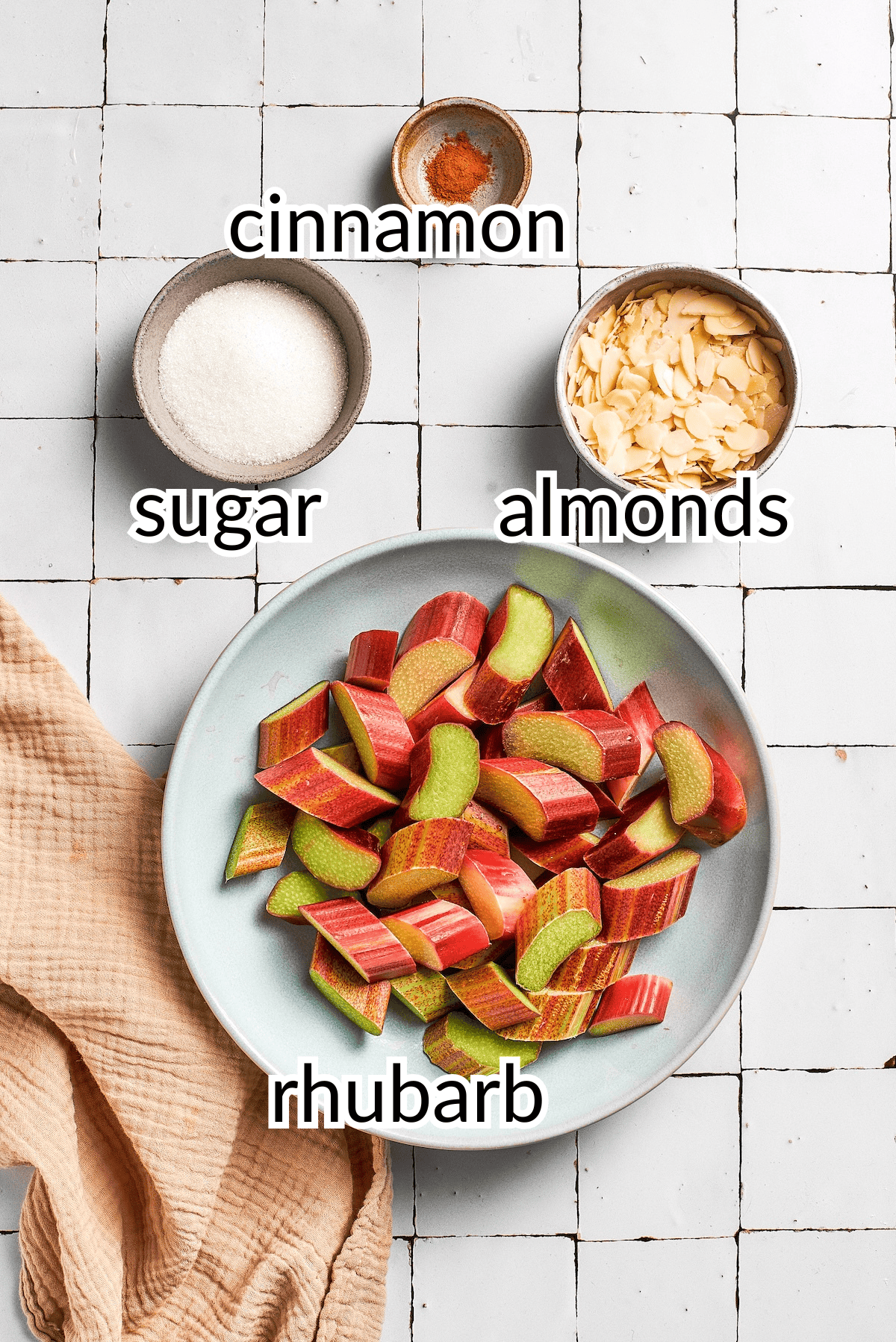 This simple Norwegian rhubarb cake is tender and delicate, with jammy rhubarb and a sprinkling of sliced almonds and cinnamon sugar on top. ingredients needed for almond and rhubarb cake