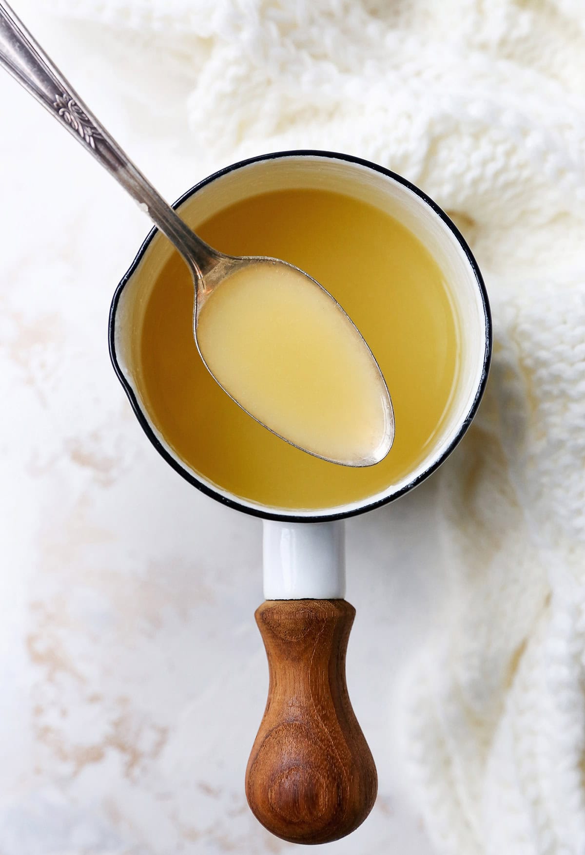 creamy butter sauce in a small saucepan