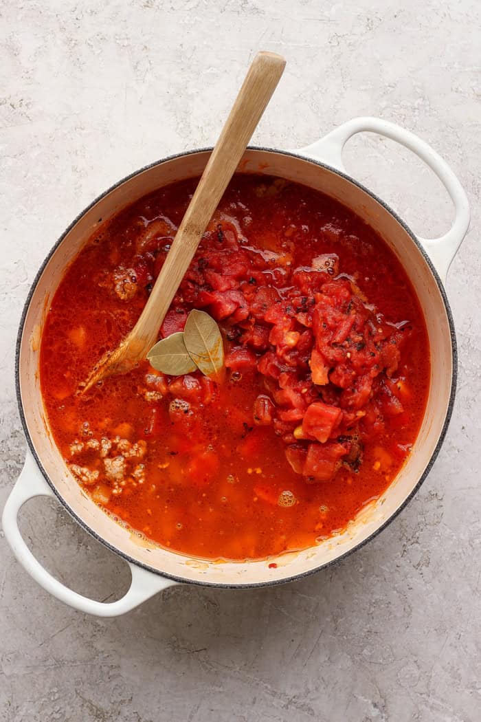 lasagna soup cooking in a large white pot
