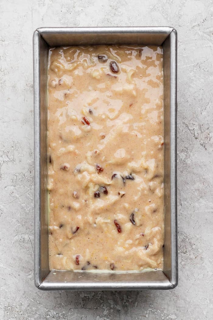 apple bread batter in a loaf pan
